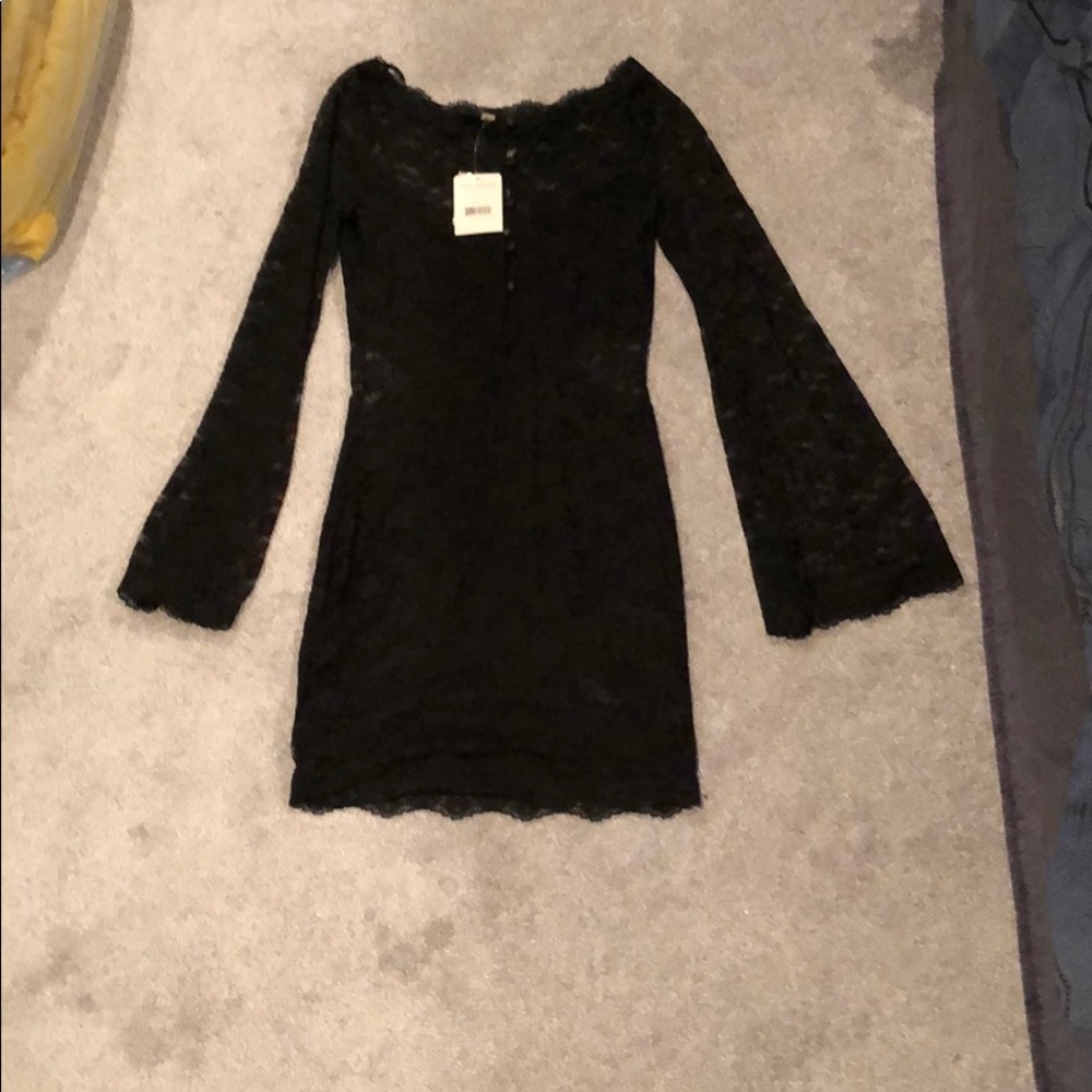 Long sleeve black lace Free People dress.
